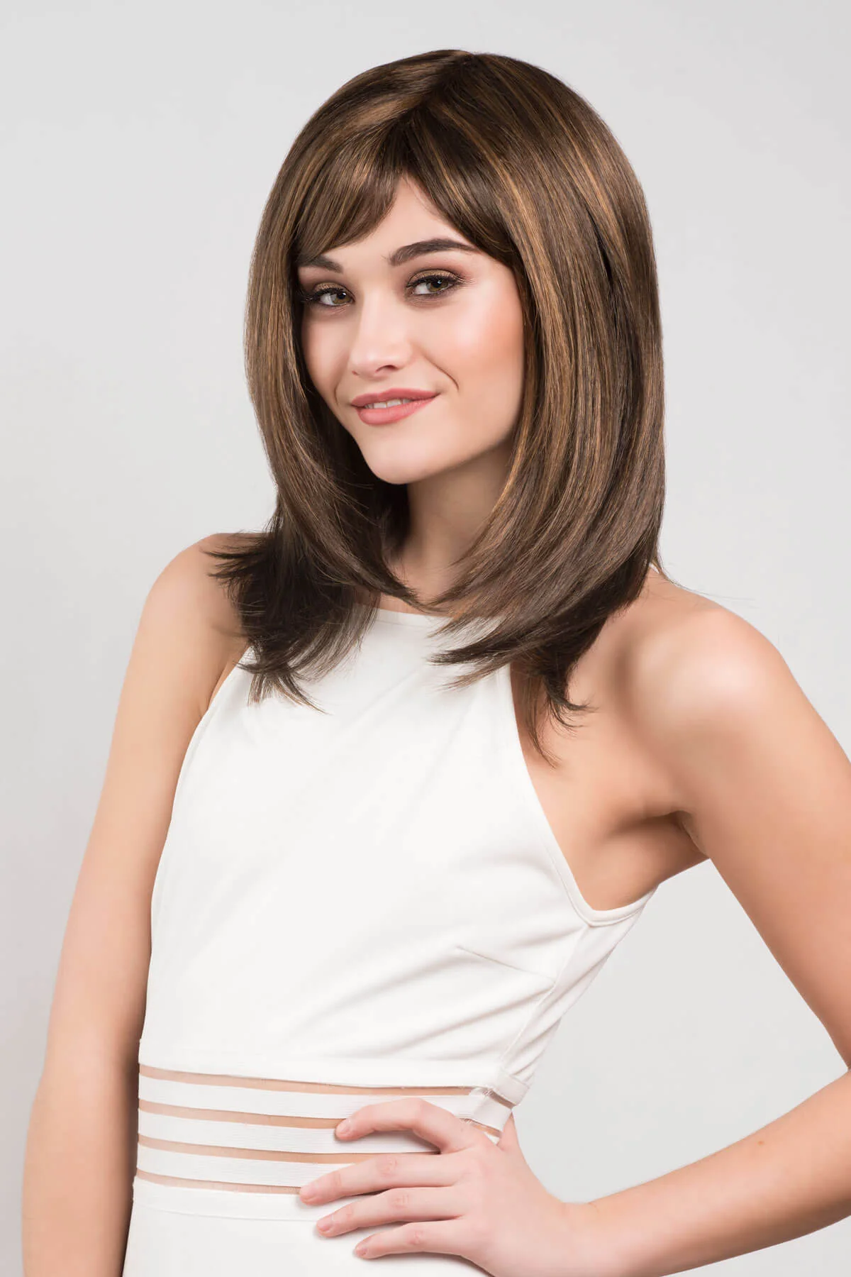 Chocolate brown wig with blonde highlights, face frame style: Katie - Image 2