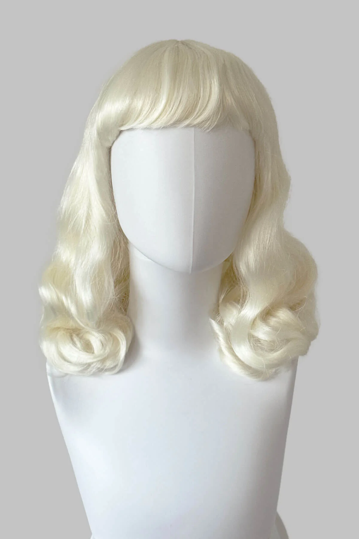 Platinum blonde pin-up style wig with short fringe and marcel waves: Eira - Image 4